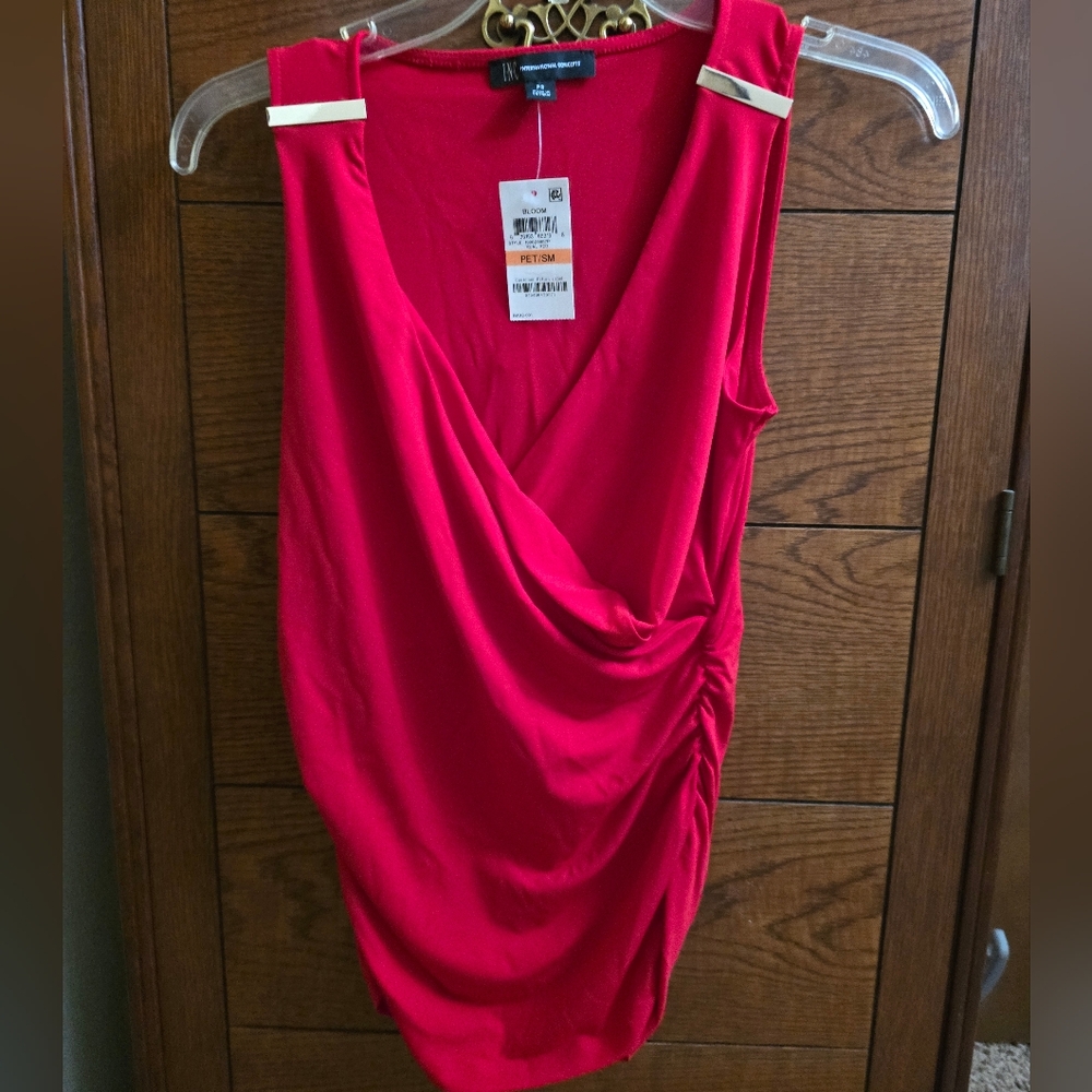 NEW INC cowl neck dressy top.